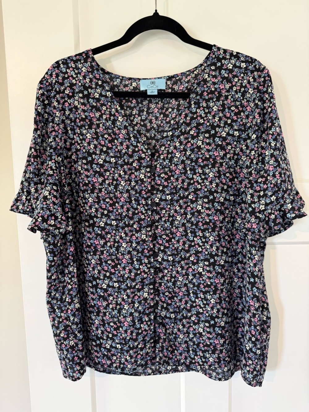 CeCe Floral Short-Sleeve Blouse - Black with Pink, White, and Blue Flowers.